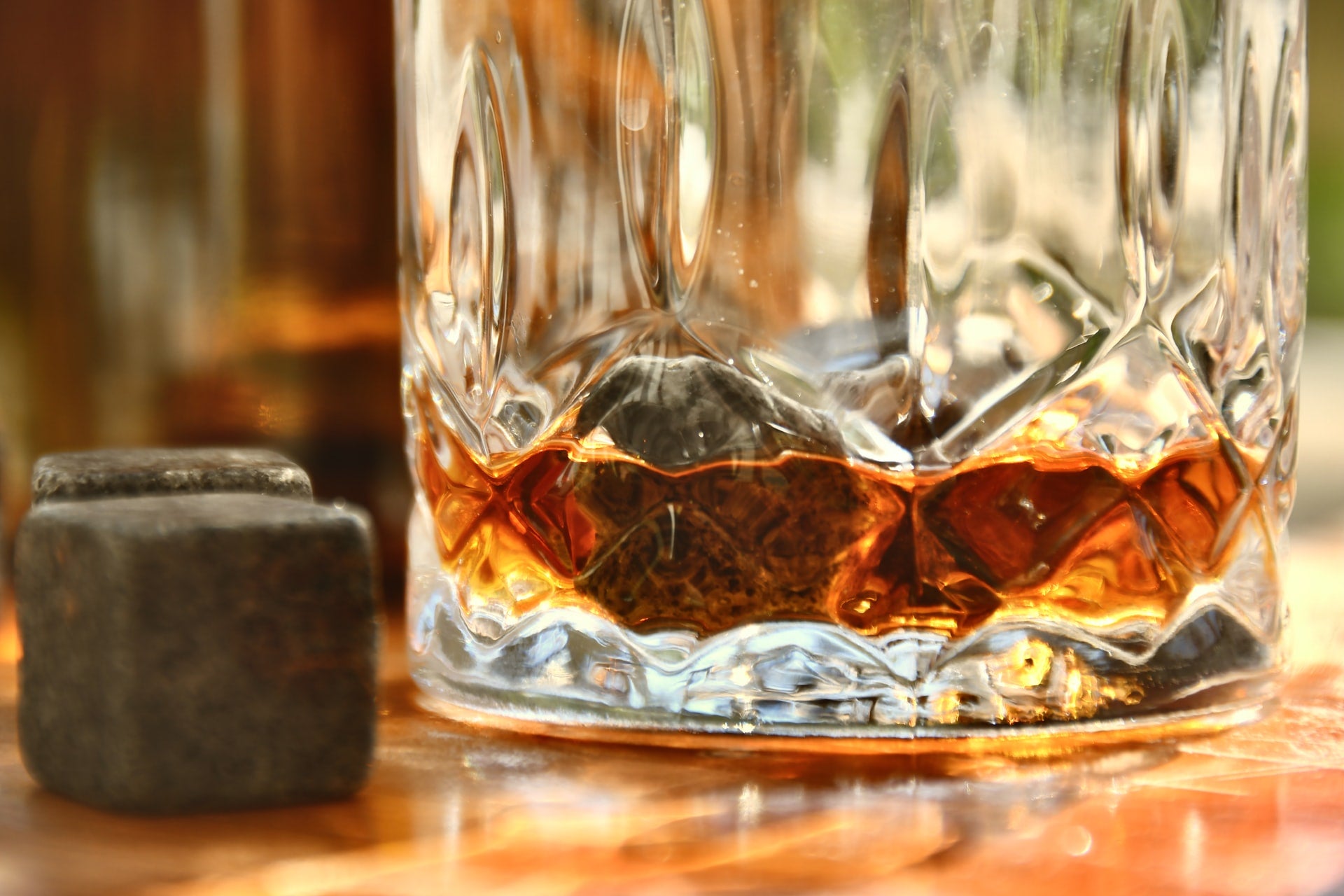 whisky stones placed in a glass of whisky
